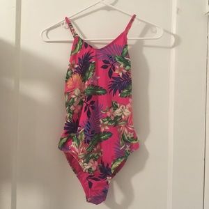 Pink one piece with floral designs